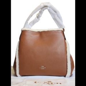 Authentic Coach
Edie 31 with Shearling Trim